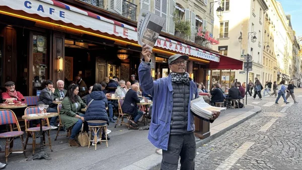 Akbar has been selling newspapers on the streets of the St Germain des Près quarter in Paris since 1973.