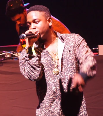 Kendrick Lamar performing on stage
