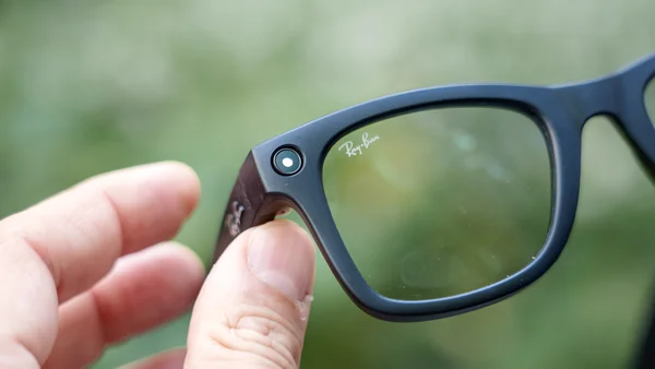Front view of Ray-Ban Meta Smart Glasses Gen 2 in matte black on a textured surface