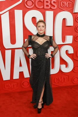 Emily Osment poses for a photo sharing Hannah Montana memories for 20th anniversary.