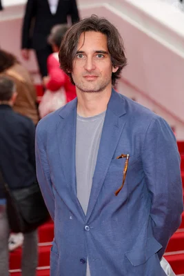 Dimitri Rassam smiling in a professional setting