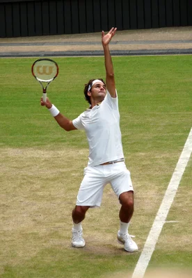 Roger Federer playing on court during the 2009 Wimbledon Championships.