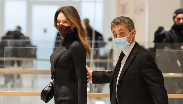 Nicolas Sarkozy et son épouse Carla Bruni au tribunal de Paris lors du procès des écoutes téléphoniques