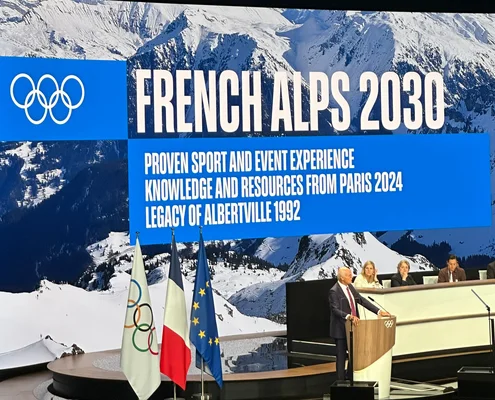 IOC presentation for 2030 French Alps Games highlighting bid and 1992 Albertville legacy.