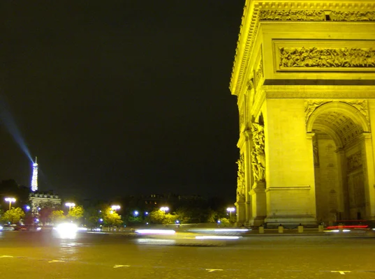 Arc de Triomphe at Night with the Eiffel Tower on the left, Paris