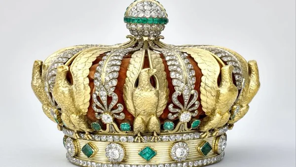 A damaged historic crown with bent prongs and empty settings, recovered after being dropped by thieves at the Louvre.