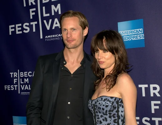 Alexander Skarsgård posing alongside actress Juliette Lewis.