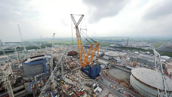 The view south across the Hinkley Point C Construction Site showing the main excavations and pipework for the cooling water s