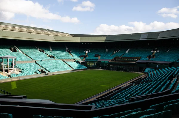 Action shot on Wimbledon Center Court during a sunny final match