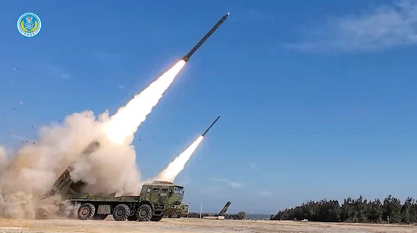 China's military released video of rockets being fired from mobile launchers during the drills on Tuesday.