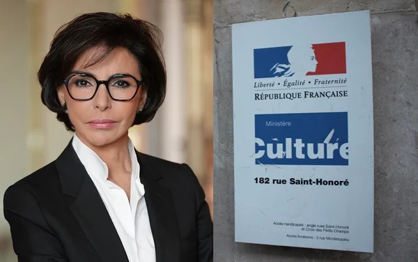 Rachida Dati en costume sombre et col roulé noir.