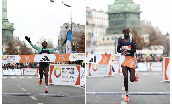 Coureurs traversant la ligne d'arrivée avec bannières de course.