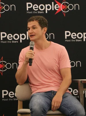 Alec Utgoff speaking at Stranger Fan Meet 4 by People Conventions in Paris, France