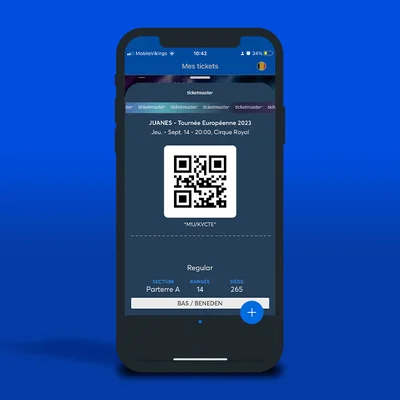 Écran de smartphone présentant un billet mobile Ticketmaster pour le concert de Juanes au Cirque Royal.