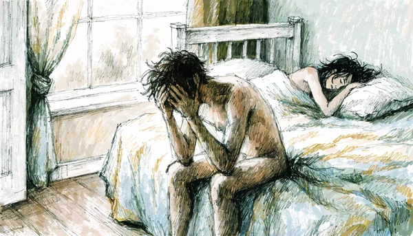 Jeune homme assis sur le bord d'un lit, visage dans les mains en signe de détresse, partenaire féminine allongée dans le flou en arrière-plan