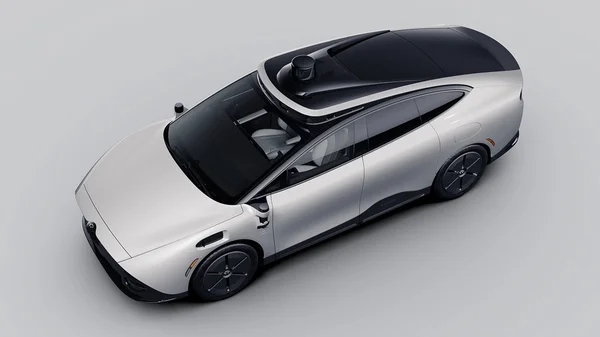 Rendu numérique de la voiture électrique autonome Tensor Robocar montrant son design futuriste et ses capteurs.