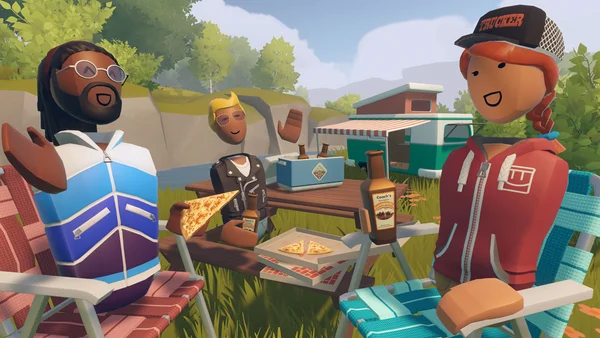 Avatars de Rec Room partageant un repas à une table de pique-nique près d'un food truck