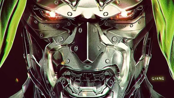 Robert Downey Jr. portant un blazer bleu et une chemise à rayures.