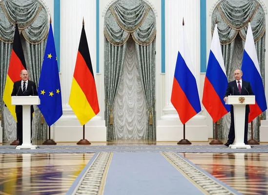 Représentants diplomatiques lors d'une rencontre illustrant les relations entre l'Allemagne et la Russie