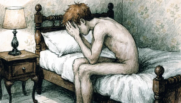 Homme nu assis au bord du lit, se tenant la tête dans les mains en signe de détresse, son corps est voûté et la posture exprime une forte anxiété, lumière tamisée de chambre