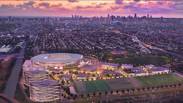 Le stade Inter Miami CF et le Miami Freedom Park baignés par la lumière du crépuscule.
