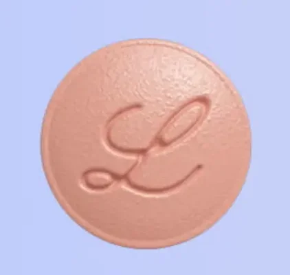 Logo vert de la FDA avec étoiles sur fond beige.