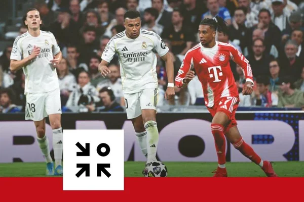 Duel entre les joueurs du Real Madrid et du Bayern Munich lors de leur confrontation tactique sur le terrain.