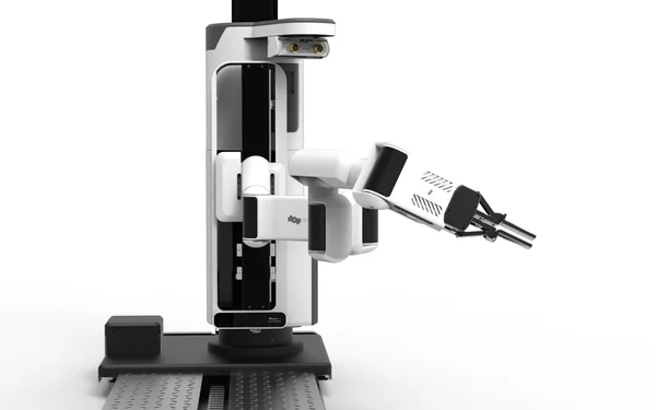 Un opérateur contrôle le robot Telesar, un avatar japonais, interagissant avec des équipements robotiques complexes en laboratoire.