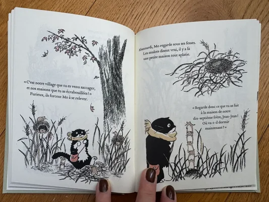 Pages intérieures du livre 'L'étoile de Mo' avec des illustrations de chats et de souris.