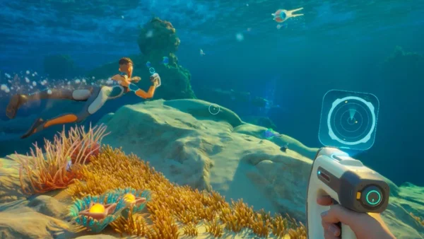 Aperçu du gameplay de Subnautica 2 montrant l'interaction entre deux plongeurs sous-marins.
