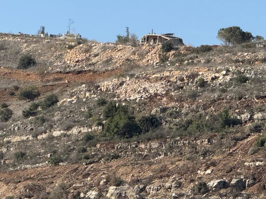 Ruines du village de Hula dans le sud du Liban, détruit lors d'une opération de l'armée israélienne en décembre 2024 en raison de tirs du Hezbollah.