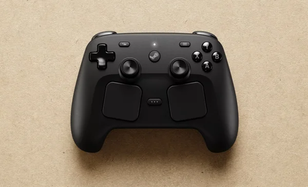 Steam Controller noire sur surface beige texturée