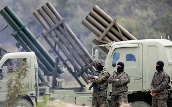 Combattants du Hezbollah lors d'un exercice militaire à Aaramta, au Liban, en mai 2023.