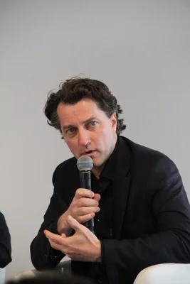 Dominique Boutonnat s'adressant à un public lors d'une intervention.