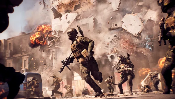 Soldats en progression dans un décor urbain dévasté dans Battlefield 6.