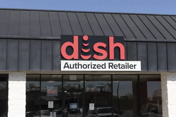 Devanture d'un revendeur agréé Dish Network avec son enseigne rouge et noire.