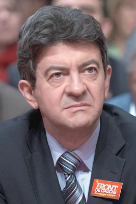 Jean-Luc Mélenchon arborant un badge du Front de Gauche en 2009.