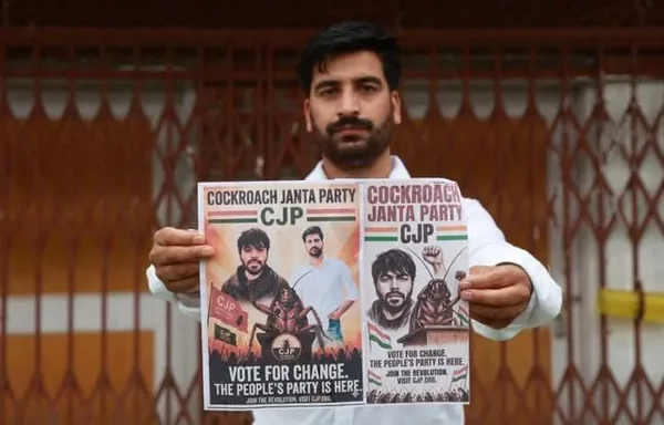 Un homme brandissant deux affiches du Parti des cafards avec le slogan 'Vote for Change'