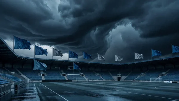 Stade désert sous un ciel menaçant, atmosphère de forfait pour le XV de France
