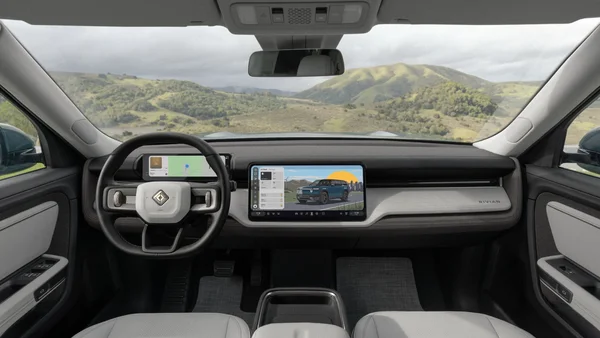 Intérieur d'un Rivian, mettant en avant la technologie embarquée au cœur de la stratégie de la marque.