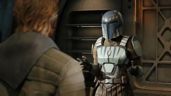 Capture d'écran de Star Wars Jedi: Survivor avec un Mandalorien s'adressant à un autre personnage.