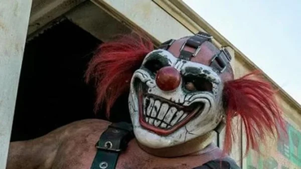 Portrait du personnage Sweet Tooth avec son masque de clown emblématique.
