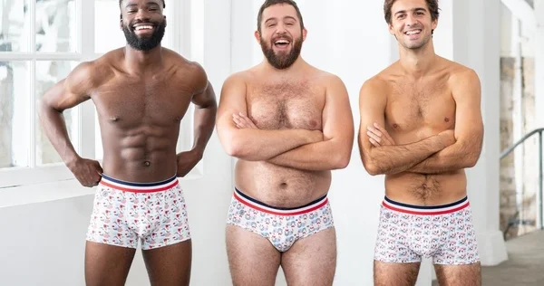 Mannequins de diverses origines portant des boxers Le Slip Français, illustrant l'inclusivité de la marque.