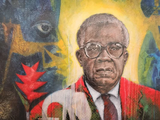 Œuvre d'art mural représentant Aimé Césaire, figure emblématique de la Négritude et ancien maire de Fort-de-France.