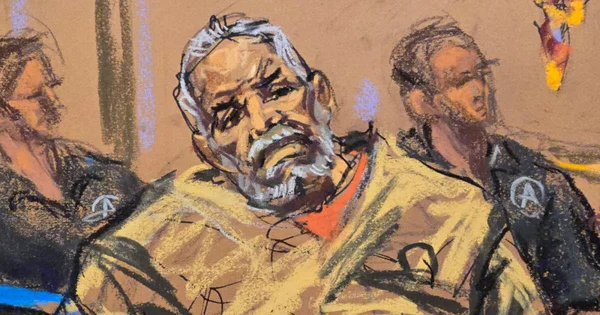 Ismael « El Mayo » Zambada au tribunal de New York, entre deux agents.