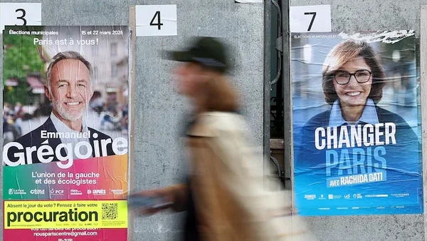Affiches électorales d'Emmanuel Grégoire et Rachida Dati lors du second tour des municipales à Paris.