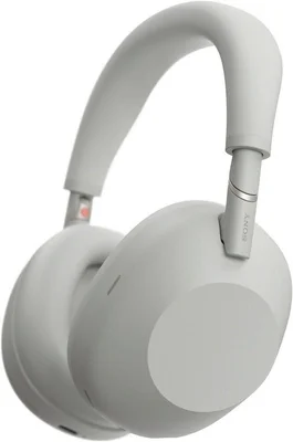 Sony WH-1000XM5 blanc, modèle précédent de la gamme, en studio sur fond neutre.