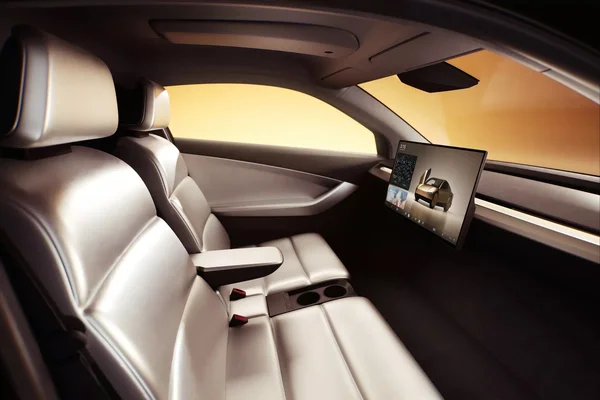 Intérieur du Cybercab avec sièges blancs et écran tactile central, sans volant ni pédales.