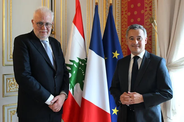 Adel Nassar et Gérald Darmanin lors d'un entretien à Paris