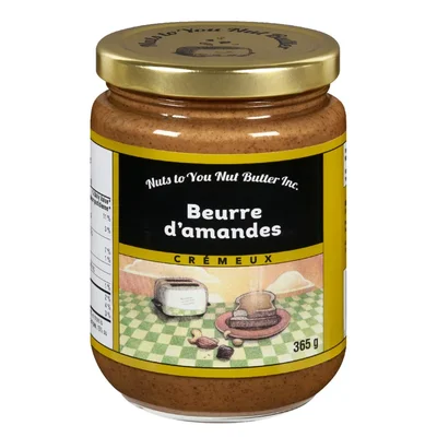 Pot de beurre d'amandes crémeux vendu chez Aldi, un produit clé dans sa stratégie de prix bas.